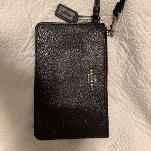 Black shimmery coach wristlet